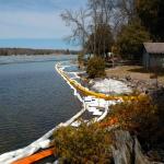 Waterfront with environmental containment bouys